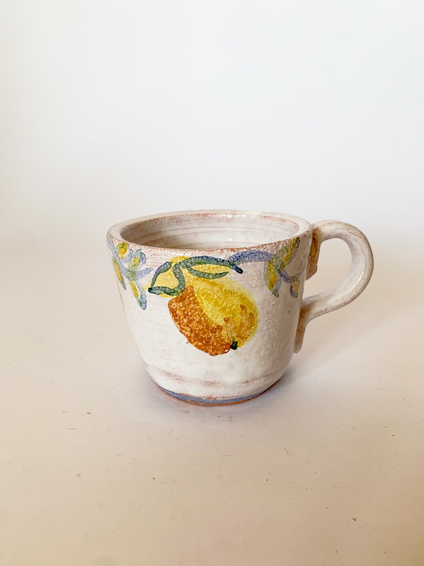 Hand Painted Lemons Studio Pottery mug, signed